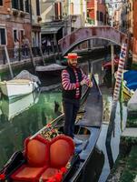 Venice, Italy - april 2,2023. Venice Grand Canal, tourists riding gondolas photo