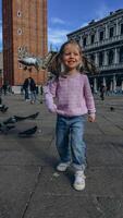 the child walks on St. Peter square in Vatican city center of Rome Italy, photo