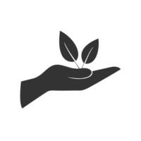 Leaves plant in a hand sign of environmental protection icon illustration. vector