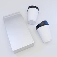 Mockup of foil pouch packaging and coffee cup, Top view perspective isolated on white background photo