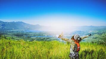 Woman asian travel nature. Travel relax. Natural Touch countryside. On the Moutain. Thailand photo