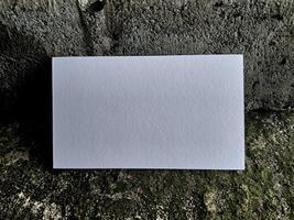 Business card white color on the floor background photo