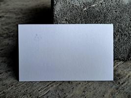 Business card white color on the floor background photo