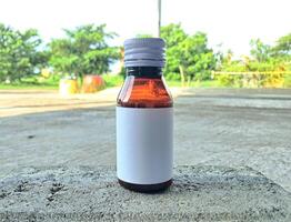 Medicine bottle brown color with a blank label for mockup or presentation mockup collection photo