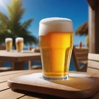 Glass of beer on the beach at sunset. Blurred background. photo