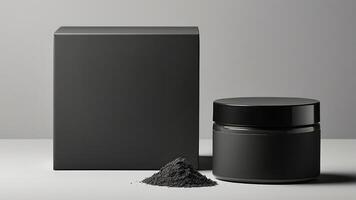 a jar of charcoal powder next to a black container photo