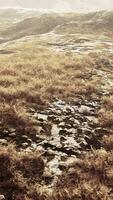 dry grass fields and mountains in Nepal video