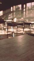 View to classroom with tables and small blackboard and grungy walls video