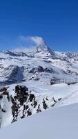 Stunning view of the Matterhorn peak on the train and glacier in Zermatt. video