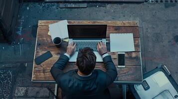 aerial view of businessman using computer laptop photo