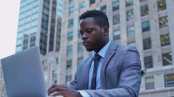 black businessman using computer laptop photo