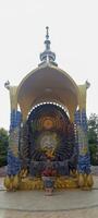 Indian god statue in shrine photo