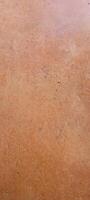 fondo abstracto con textura rústica de terracota naranja foto