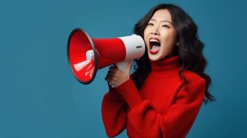 Woman with megaphone. Young girl screams into loudspeaker. Sale and discount in store. News and business announce. Copy space for template on blue background. photo