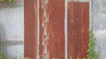 Texture of rusty galvanized metal roof sheets background photo