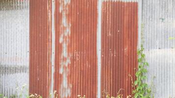 Texture of rusty galvanized metal roof sheets background photo