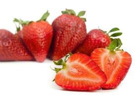 a group of strawberries on a white background photo