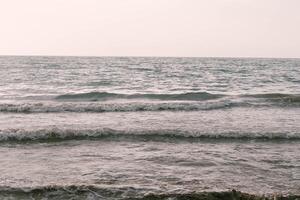 Evening time on the sea beach photo