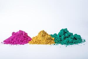 Pile of multicolored holi powder isolated on white background. photo