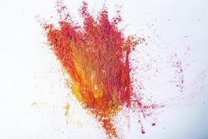 Colorful holi powder explosion on white background. photo