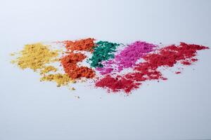 Multi color holi powder isolated on white background. photo