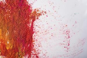 Colorful powder for Holi festival on white background. Holi is the Indian festival of colors. photo