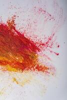 Colorful holi powder explosion on white background. photo