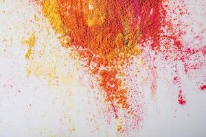 Multicolored mixed holi powder scattered on white background. photo