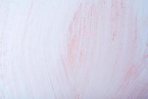 Pink paint brush stroke on white paper texture. Abstract background and texture for design. photo