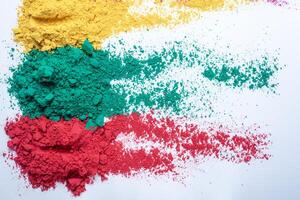 Multicolored holi powder isolated on white background. photo