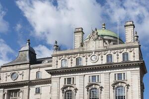 LONDON, UK - MARCH 11. Historical building on the corner of Piccadilly Circus in London on March 11, 2019 photo