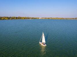 View of a yacht on Lake Palic in Serbia photo