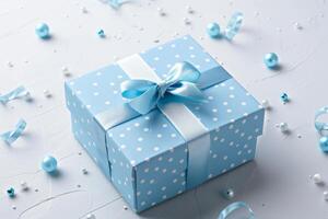 Blue gift box with bow, on white background photo