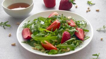 Vitamin salad of strawberry with arugula video