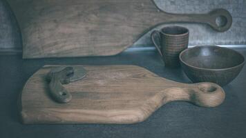 Pizza knife with walnut handle on a large cherry cutting board photo