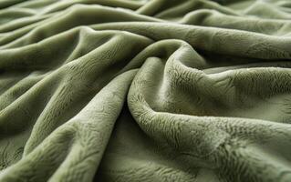 A green piece of fabric with a zigzag pattern photo