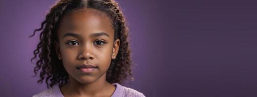 An African American Juvenile Girl Isolated On A Amethyst Background With Copy Space. photo