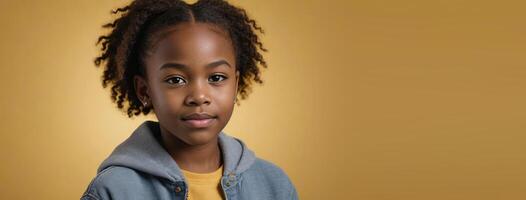 An African American Youthful Girl Isolated On A Yellow Background With Copy Space. photo