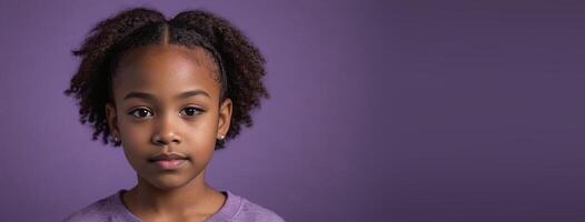 An African American Juvenile Girl Isolated On A Purple Background With Copy Space. photo