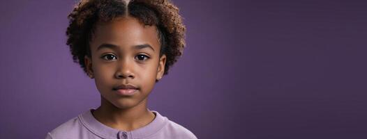 An African American Juvenile Girl Isolated On A Amethyst Background With Copy Space. photo