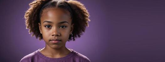An African American Kin Girl Isolated On A Amethyst Background With Copy Space. photo