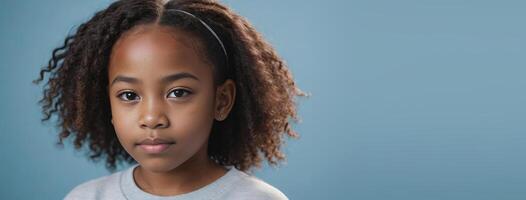 An African American Kinfolk Girl Isolated On A Light Blue Background With Copy Space. photo