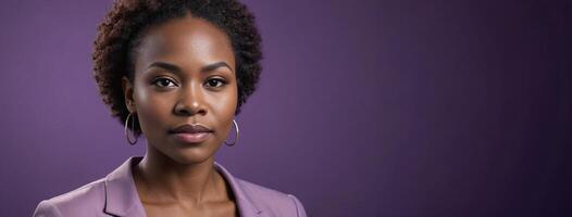 African American 2530 Years Woman Isolated On A Purple Background With Copy Space. photo