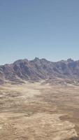 An aerial view of a mountain range in the desert video