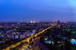 Uzbekistan, Tashkent - September 29, 2023 Top view from the observation deck on the Tashkent TV tower to the central part of the city covered with smog at nighttime . Air polution. photo