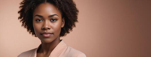 African American Ethnicity 30S Woman Isolated On A Peach Background With Copy Space. photo