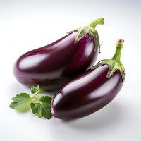 Two eggplant and basil on white background. Clipping path included photo