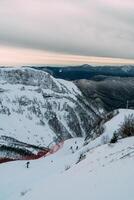 Skiing at Krasnaya Polyana Resort on Sunny Day, Enjoying Beautiful Nature photo