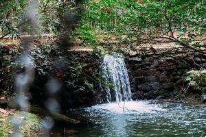 Small Waterfall in City Park, Stunning Autumn View, Beauty of Nature Background photo