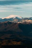 Mount Akhun tower offers stunning views of mountains and autumn landscape. photo